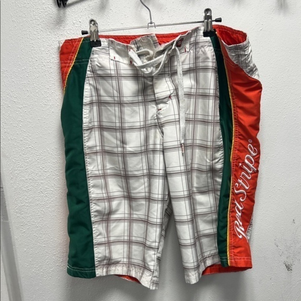 Vibrant Red and Green Swim Trunks for Leisure